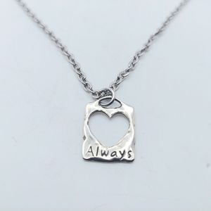 .925 Sterling 3/4 x 1/2 Inch Heart Charm on 18 Inch Stainless Chain Necklace.